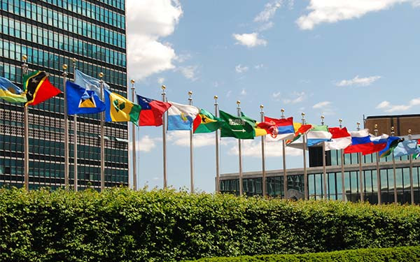 Line of world flags outside the United Nations headquarters