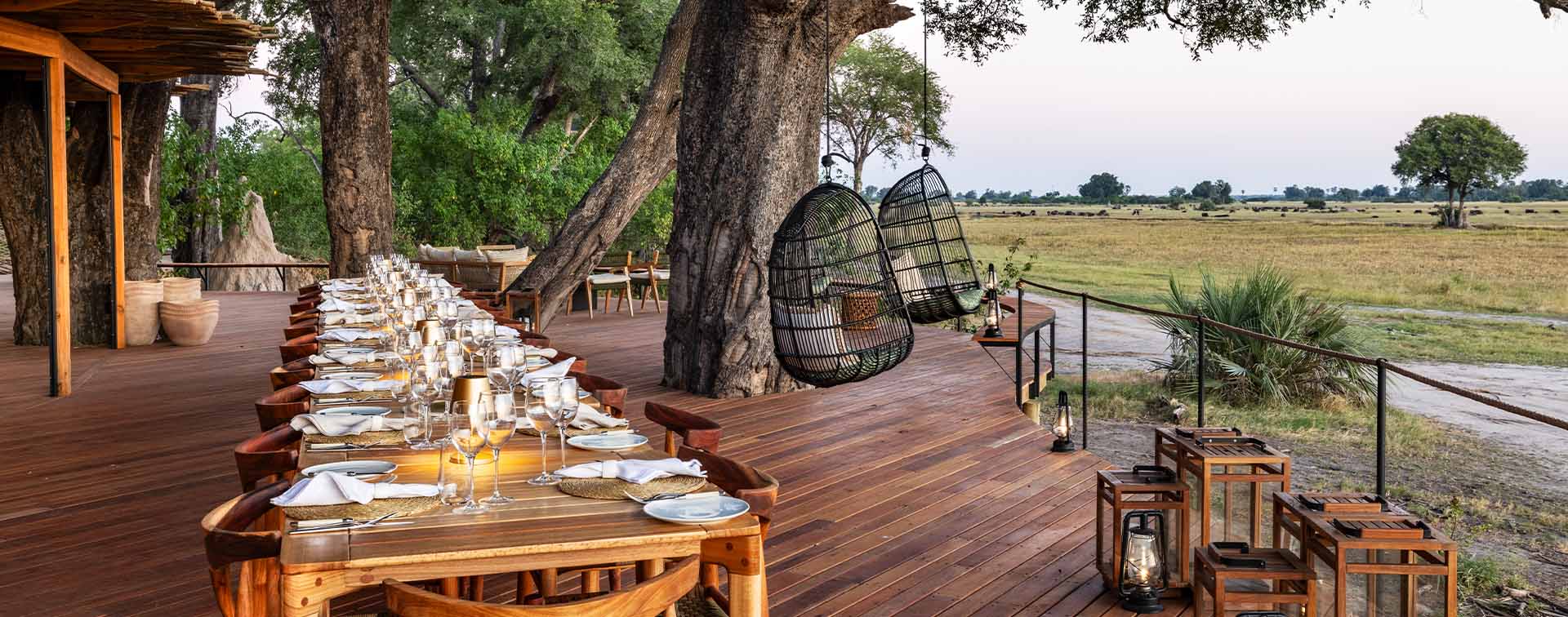 Table set on the balcony of a luxury safari loge