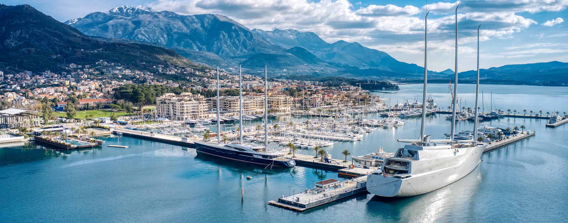 Porto Montenegro marina with super yacht in the foreground