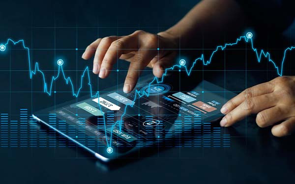Businessman using tablet for online banking, currency exchange, finance, and digital investment