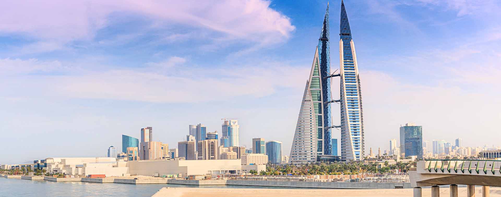 Bahrain, Manama skyline featuring modern skyscrapers along the waterfront and new developments