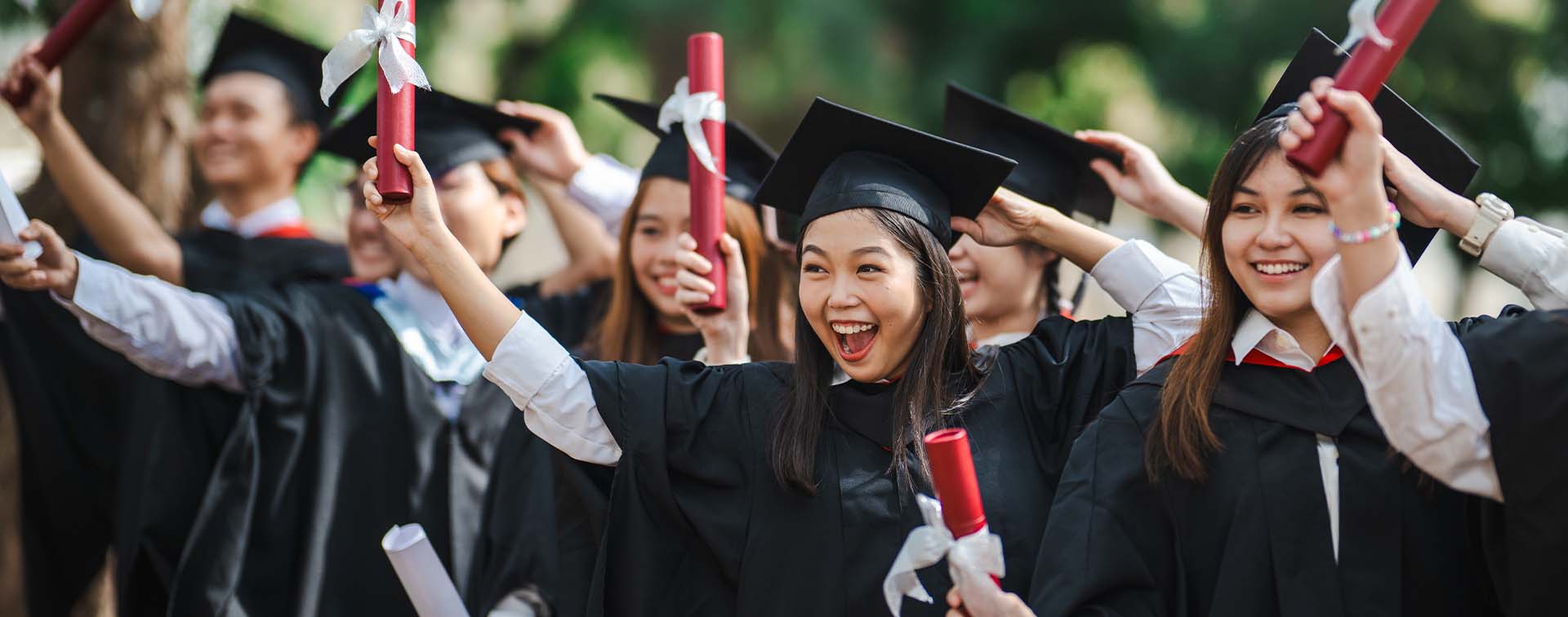 University students celebrating their graduation