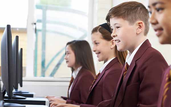 Students using computers in a classroom