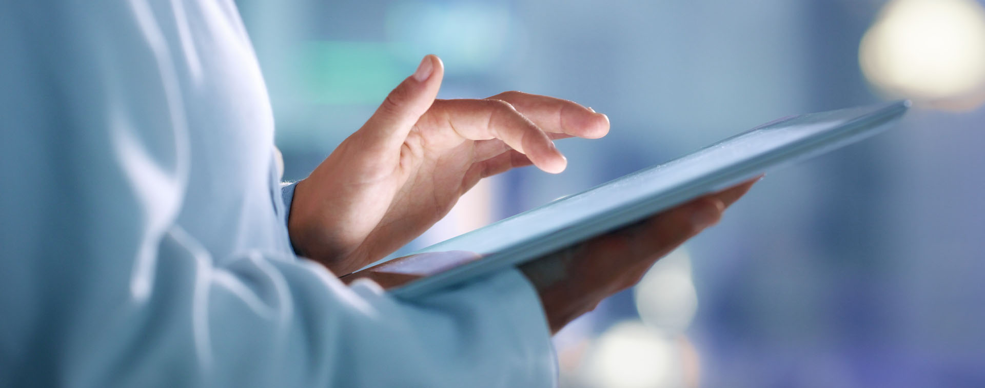 Person using a tablet in a professional setting