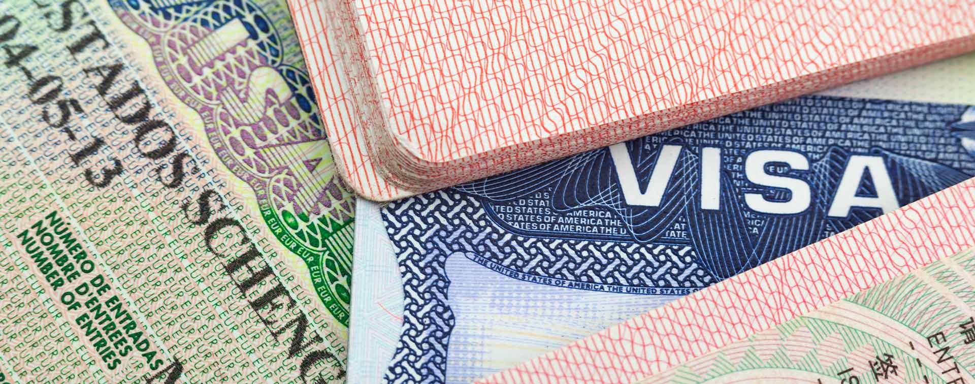 Chinese, USA and Shengen European visas in passports