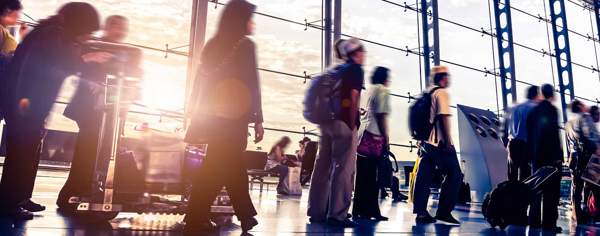 Blurred shot of people walking through Malaysia airport