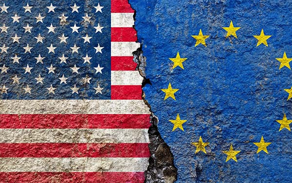 American and European Union Flag on Cracked Surface