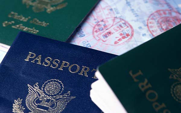 American passports on top of other opened passports