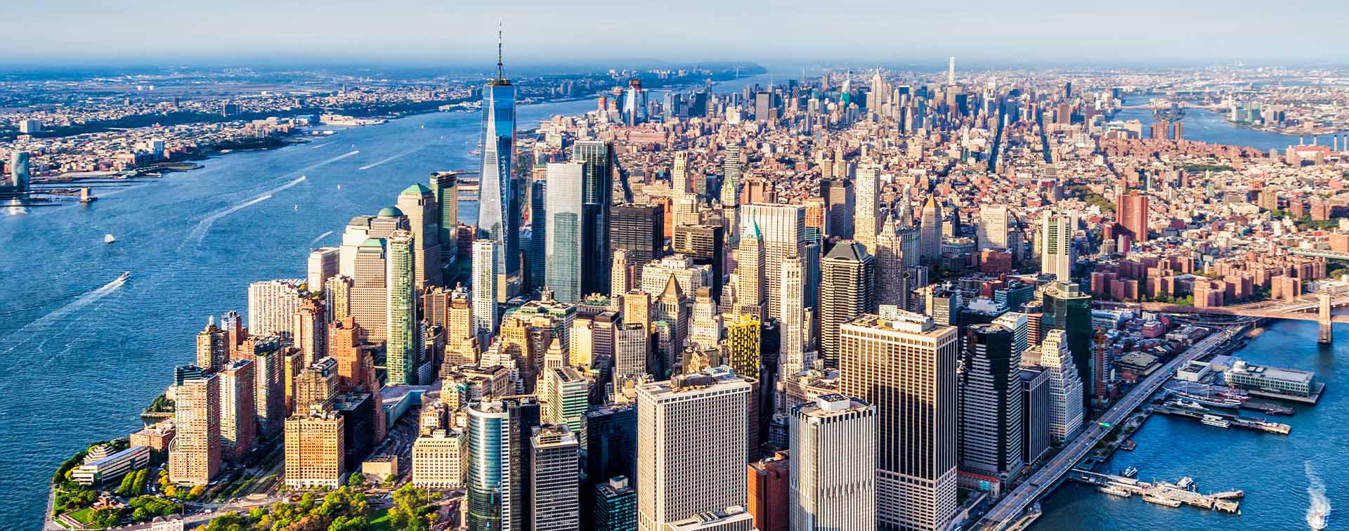 Panoramic aerial view of Lower Manhattan at sunset