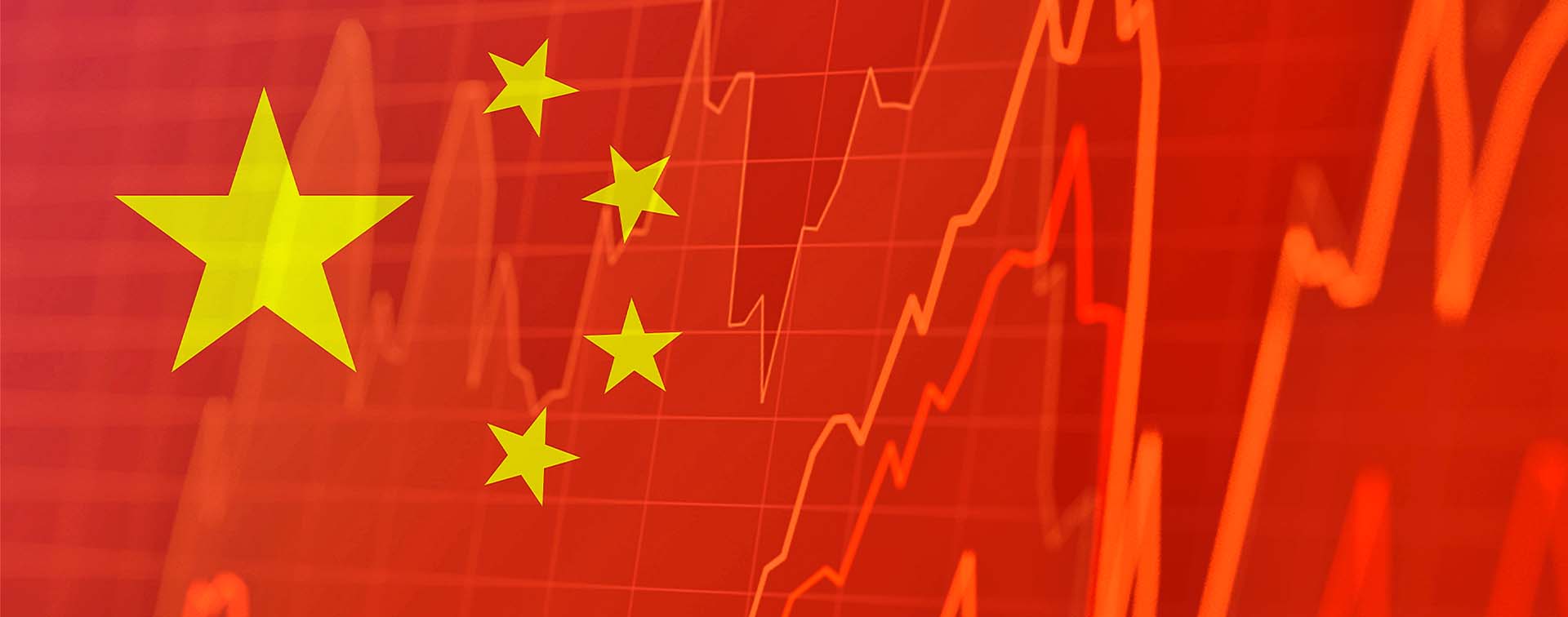 Chinese flag and stock market indicators - concept of Chinese economic trends