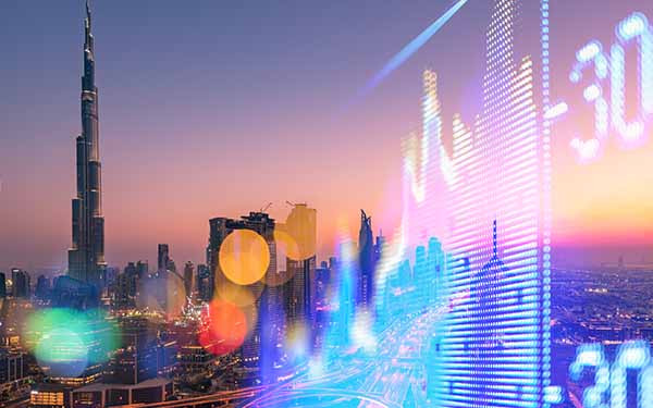Stock Market Exchange on a skyscraper in Dubai background
