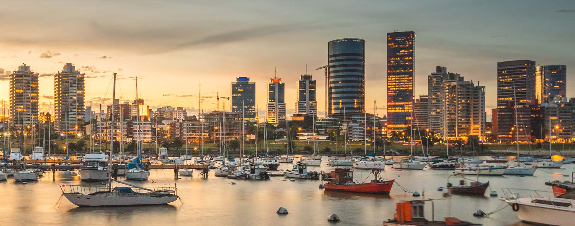 Skyline of Montevideo at sunset with warm sunshine tones