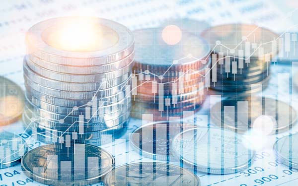 Growing money saving and investment concept; double exposure of coins stack on bank account book with growing trend candle stick graph - concept of tax