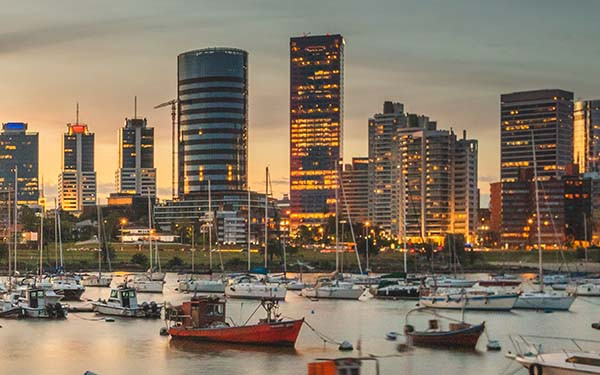 Skyline of Montevideo at sunset with warm sunshine tones