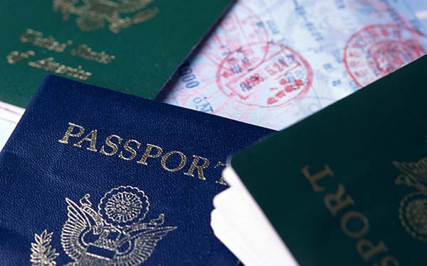 - Multiple passports and visa documents