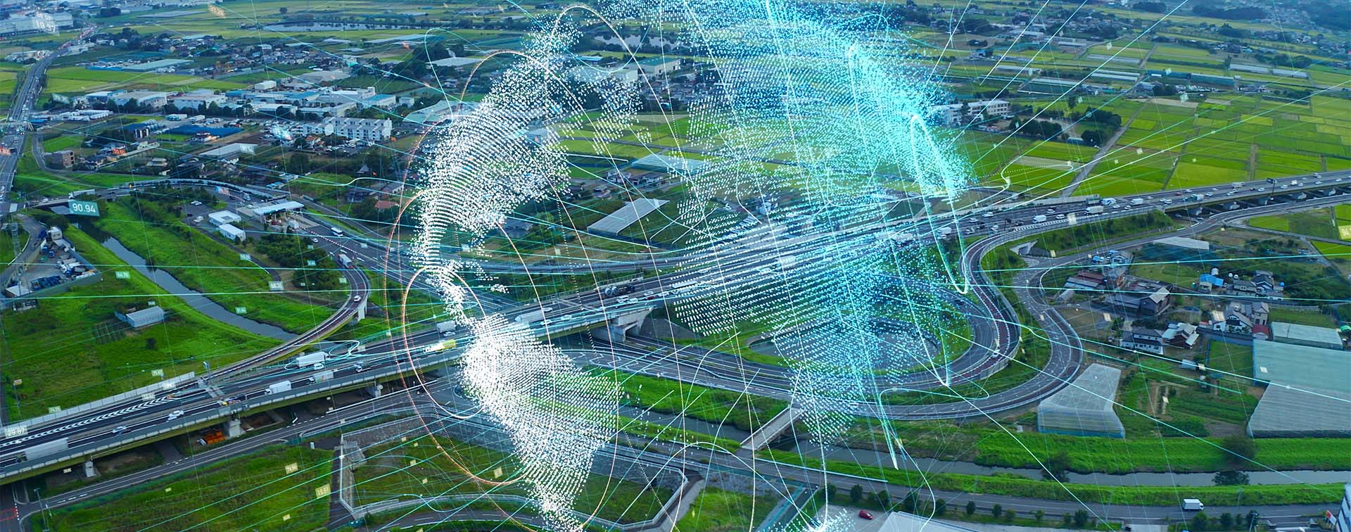 Glowing digital globe over a connected system of highways.