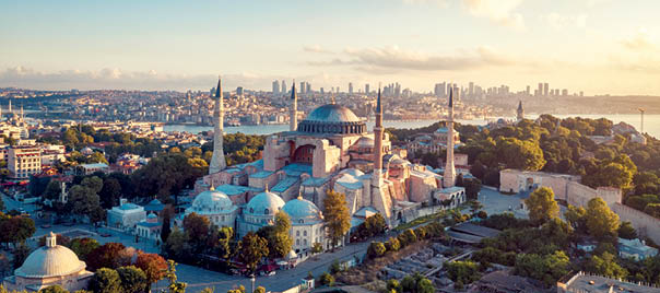 Sunrise drone photo of Hagia Sophia Church and the Istanbul cityscape. Hagia Sophia is the former Greek Orthodox Christian patriarchal cathedral, later an Ottoman imperial mosque and now a museum in Istanbul, Turkey.  Photo taken on 08/11/2019 by drone device.