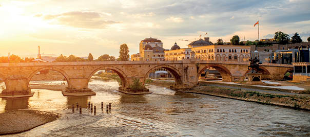 View on Stone bridge from Oko bridge in Skopje on sunset