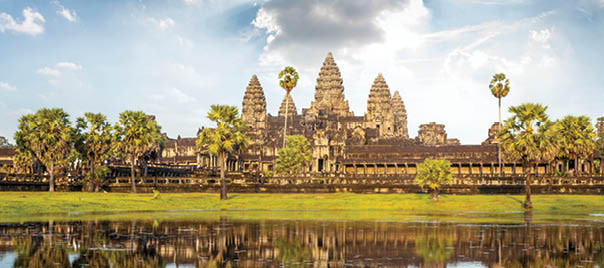 The Temple Of Angkor Wat Reflected In The Lake Near Siem Reap In Cambodia.