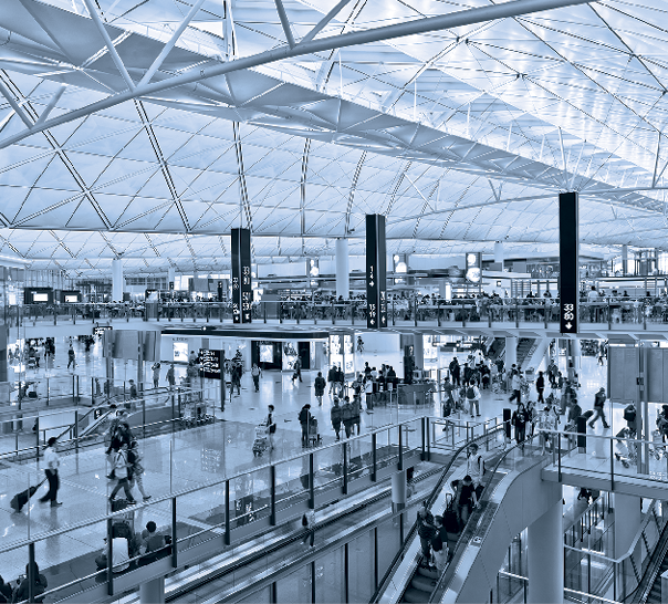 Travelers inside Hong Kong International airport, China, Asia.