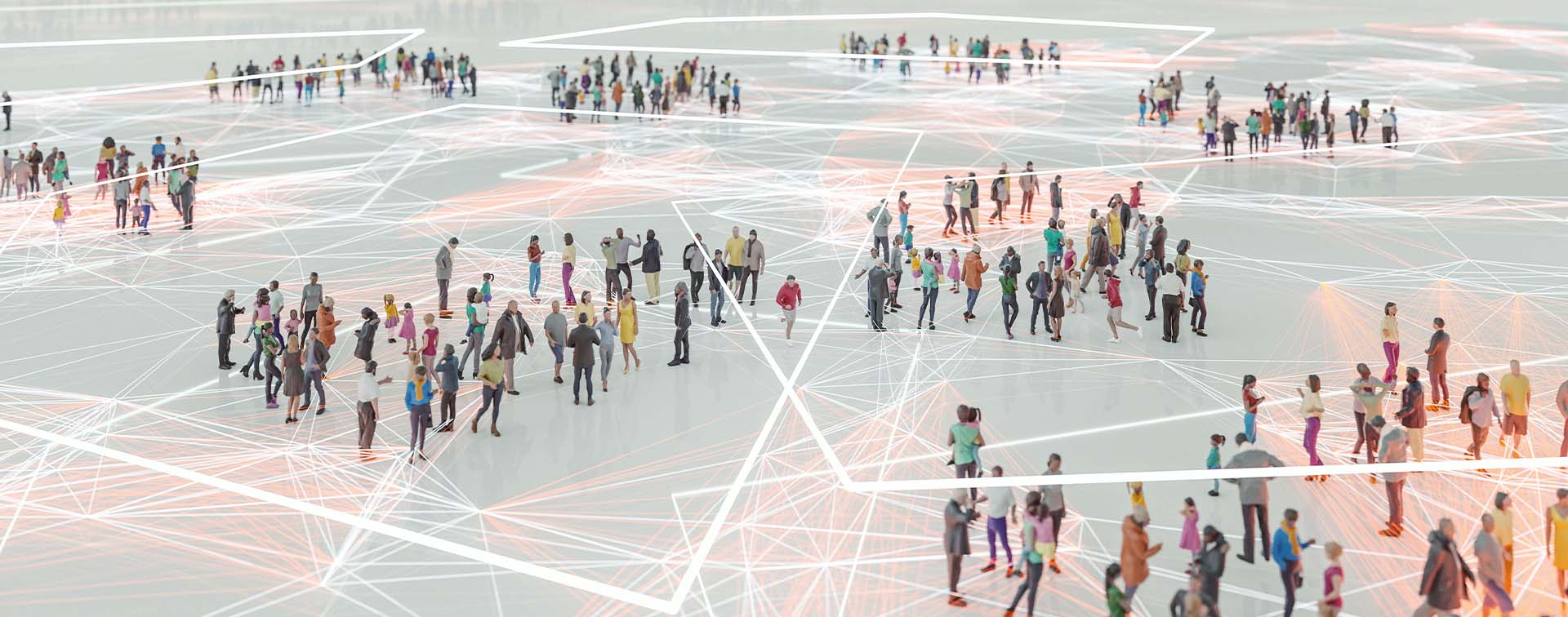 Aerial view of people standing spread out in groups across a patterned floor