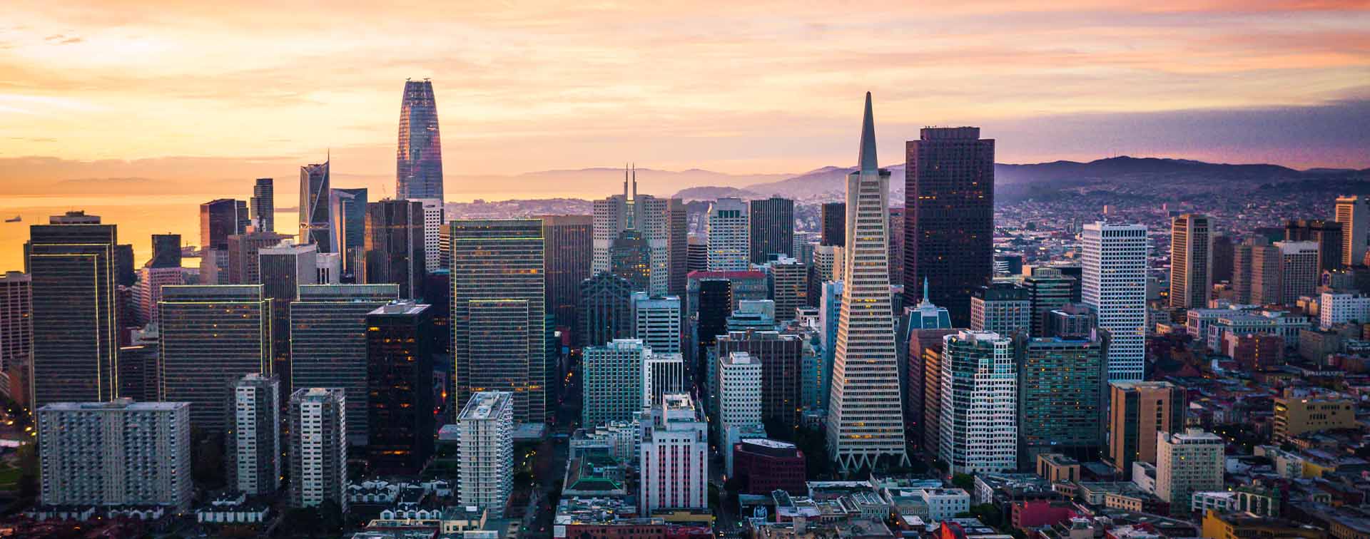 The San Francisco skyline at sunrise